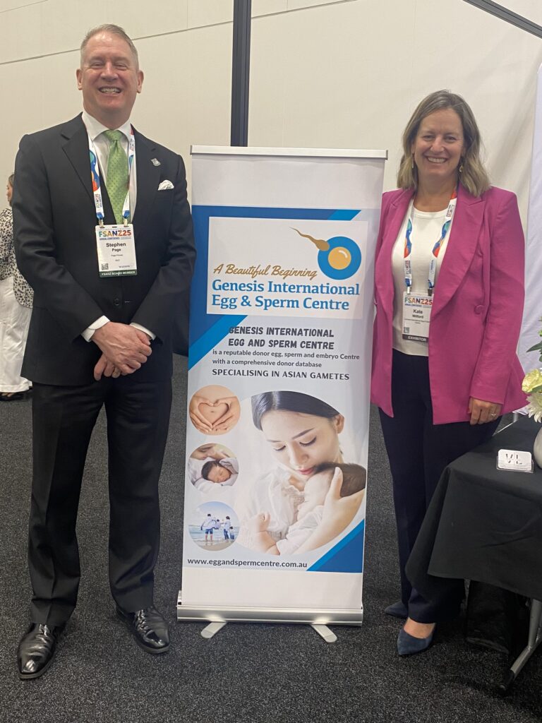 pic with a sign with Kate Wilford- wearing pink jacket